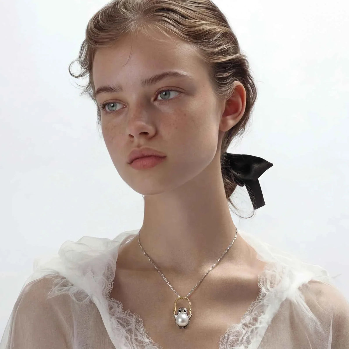 Perlenkette mit weiser Eule – Eleganter Schmuck mit Bedeutung